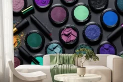 Fototapeta: A collection of colorful eyeshades and brushes on a table with