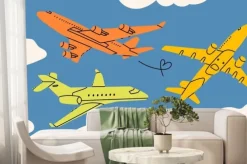 Fototapeta: Aircraft flying above the clouds. silhouettes of colorful passenger