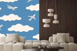 Fototapeta: Aircraft flying above the clouds. silhouettes of white passenger