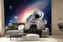 Fototapeta: Astronauta w kosmosie na tle galaktyki