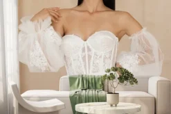 Fototapeta: Beautiful bride dressed in a white wedding dress with a deep