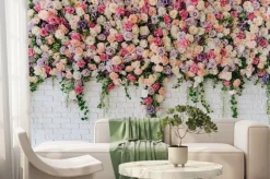 Fototapeta: Beautiful decorative colorful roses on brick wall. wedding party