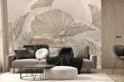 Fototapeta: Beżowe liście na betonowej ścianie