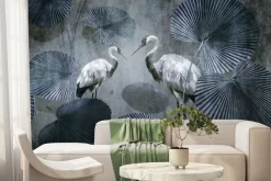 Fototapeta: Białe żurawie wśród dużych tropikalnych liści