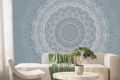 Fototapeta: Biały szkic mandali w niebieskiej scenerii