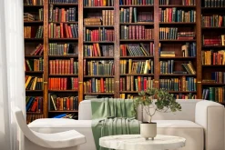 Fototapeta: Biblioteka pełna książek i ksiąg na półkach