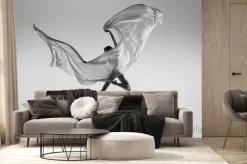 Fototapeta: Black and white portrait of graceful ballerina dancing with fabric,