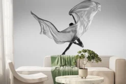 Fototapeta: Black and white portrait of graceful ballerina dancing with fabric,