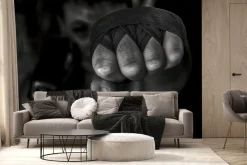 Fototapeta: Bokser mężczyzna uderza pięścią