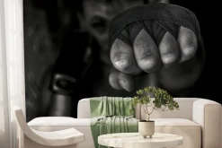 Fototapeta: Bokser mężczyzna uderza pięścią