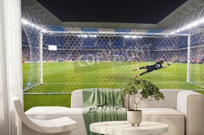 Fototapeta: Bramkarz rzucający się w obronie w stronę piłki