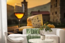 Fototapeta: Cheese and wine on background of italian landscape. based on