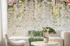 Fototapeta: Ściana z białymi kwiatami