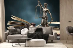 Fototapeta: Closeup of a sculpture of themis, book and gavel, symbol of justice