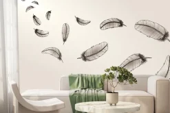 Fototapeta: Czarne malowane pióra na jasnym tle