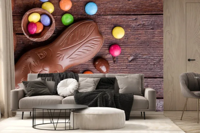 Fototapeta: Czekolada pisanki i słodycze na tle drewnianych