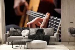 Fototapeta: Człowiek gra na gitarze akustycznej