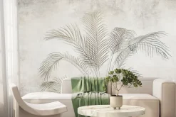 Fototapeta: Delikatne liście palmowe na betonowym tle
