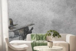 Fototapeta: Drewniany samolot zabawka na szarym tle