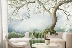 Fototapeta: Drzewo wiśni na łące z bocianami