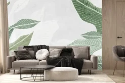 Fototapeta: Duże tropikalne zielone liście na jasnym tle