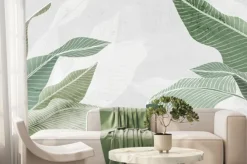 Fototapeta: Duże tropikalne zielone liście na jasnym tle