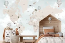 Fototapeta: Dziecięca mapa świata na tle nieba z chmurami