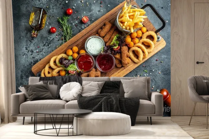 Fototapeta: Fast food meals mozzarella sticks, onion rings, french fries,
