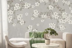 Fototapeta: Gałęzie z białymi kwiatami na betonie