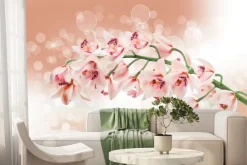 Fototapeta: Gałązka z kwiatami storczyka wśród bąbelków