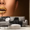 Fototapeta: Golden lipstick closeup. liquid metal dripping from gold lips.