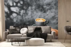 Fototapeta: Gray cup of fresh cappuccino in woman hands on background of