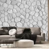 Fototapeta: Gray stone walls are beautifully arranged in the background.