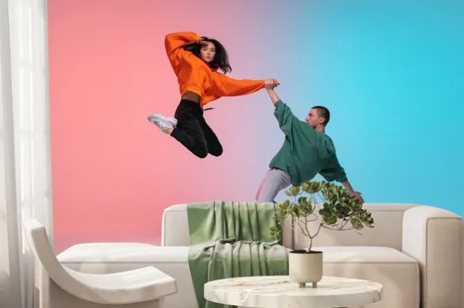 Fototapeta: In jump. boy and girl dancing hip-hop in stylish clothes on colorful