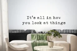 Fototapeta: Inspirujący cytat wpisany na starej maszynie do pisania.