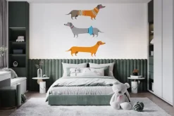 Fototapeta: Jamniki w ubraniach na białym tle