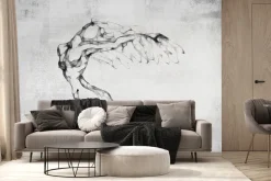 Fototapeta: Kobieca sylwetka w stylu akwareli na betonowym tle w szarości