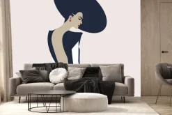 Fototapeta: Kobieta w kapeluszu na jasnym tle