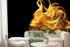 Fototapeta: Kobieta w złotawych kolorach na czarnym tle