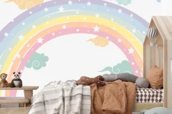 Fototapeta: Kolorowa tęcza z gwiazdkami wśród chmur