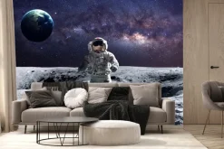 Fototapeta: Kosmonauta na księżycu na tle ziemi