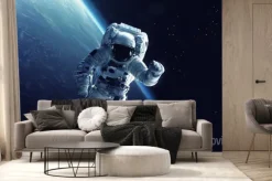 Fototapeta: Kosmonauta na tle ziemi