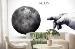 Fototapeta: Kosmonauta wskazujący na księżyc