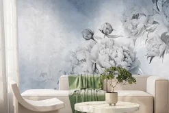 Fototapeta: Kwiaty piwonii na niebieskim tle