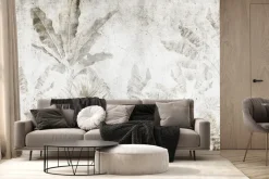 Fototapeta: Liście bananowca na betonowej ścianie w stylu urban jungle