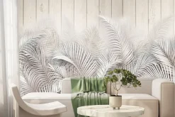 Fototapeta: Liście palm na drewnianych deskach