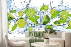 Fototapeta: Limonki w wodzie na białym tle