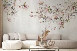 Fototapeta: Magnolia kwiaty na gałązkach drzewa na tle betonu