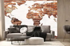 Fototapeta: Mapa świata z cegły na jasnej ścianie