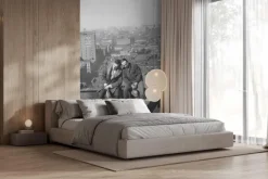 Fototapeta: Mężczyźni na metalowej konstrukcji na tle miasta